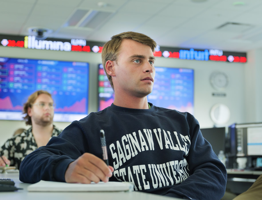 Student looking forward in classroom 